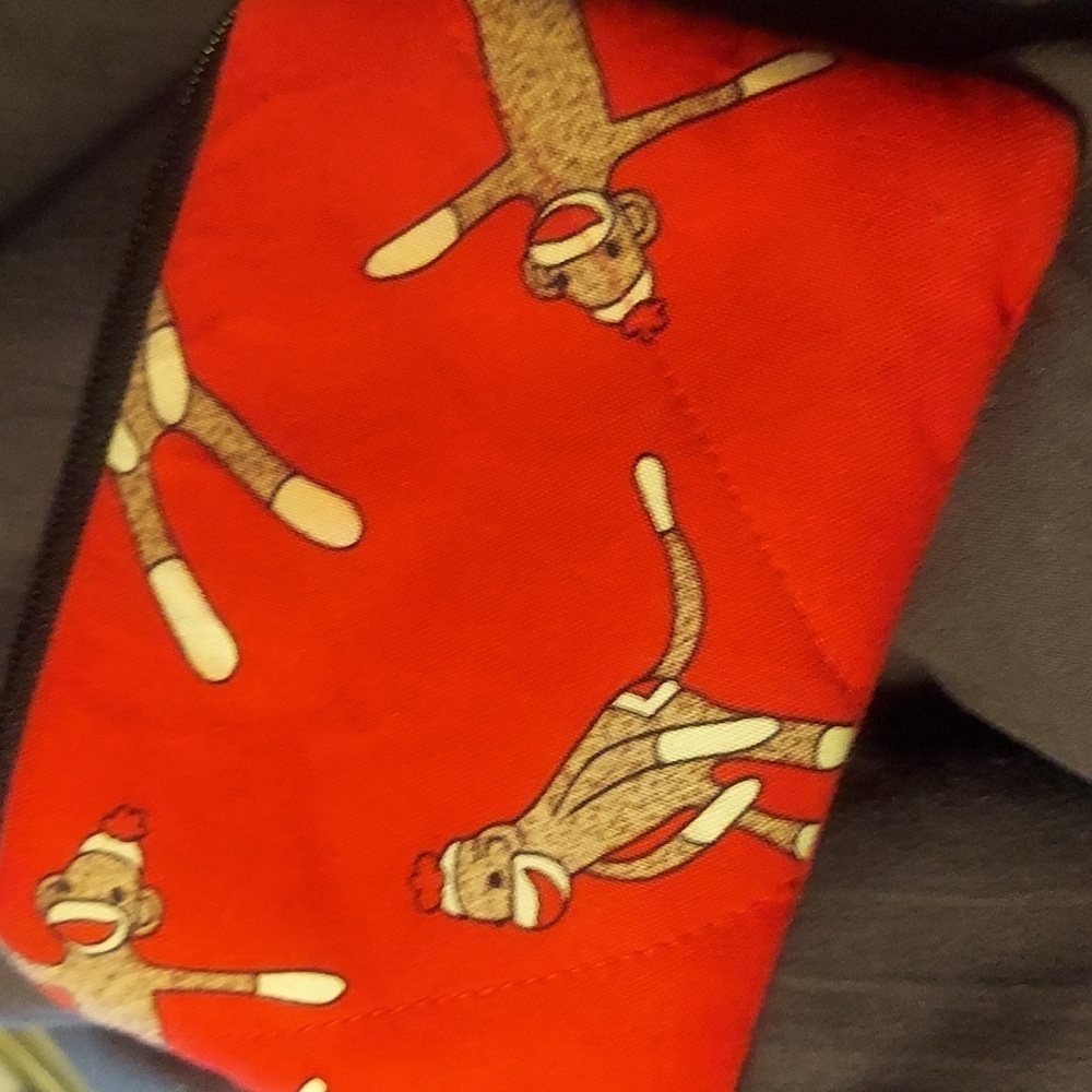 - Adorable hand made (michigan) sock monkey zip wallet / coin purse